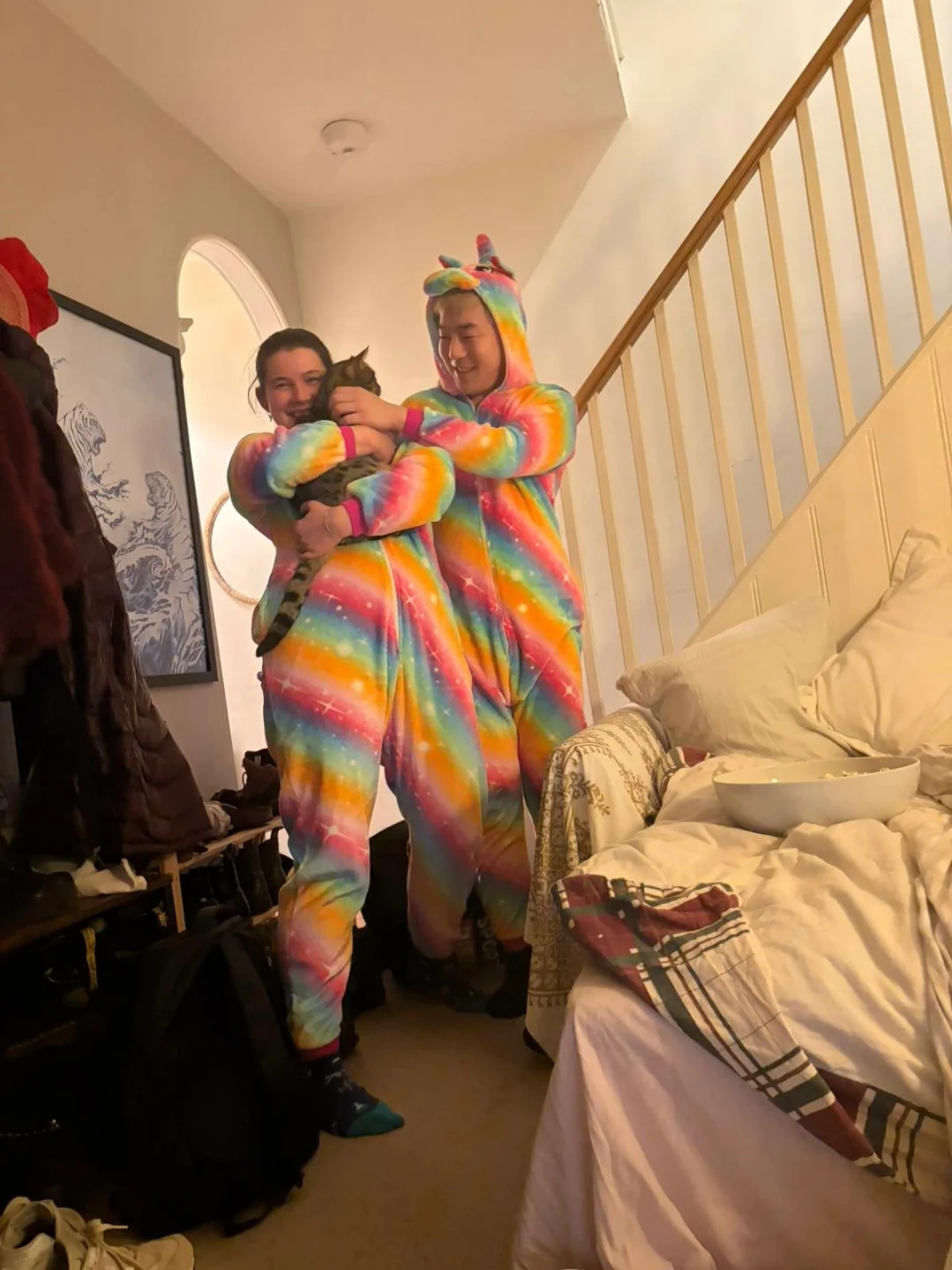 Anna and Cong in matching onesies